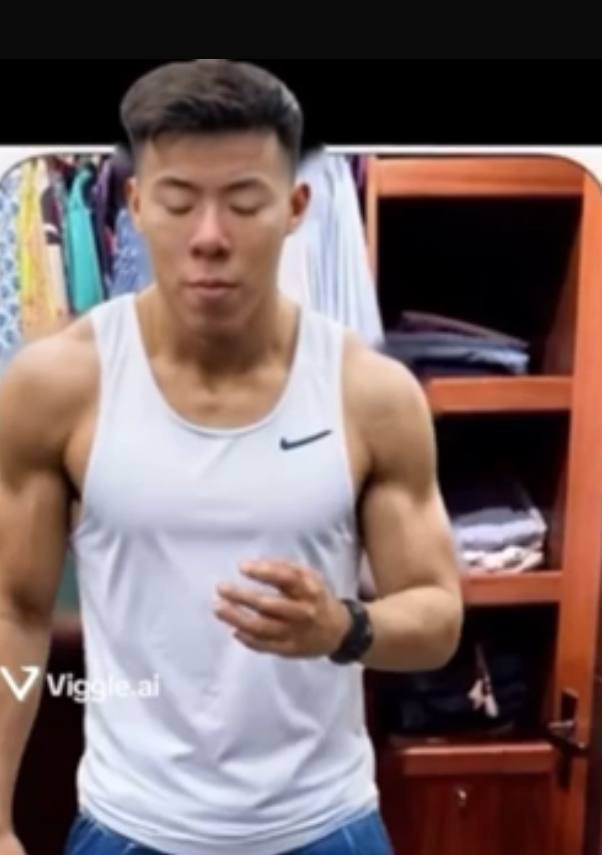 Portrait in a white training vest, indoors